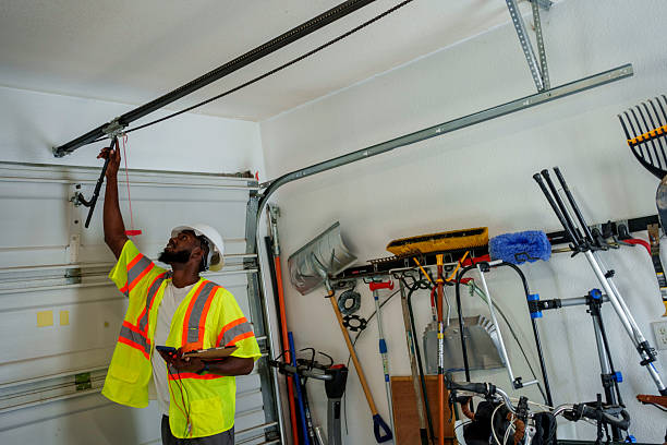 Professional Garage Door Panel Replacement technician working in Warren, PA